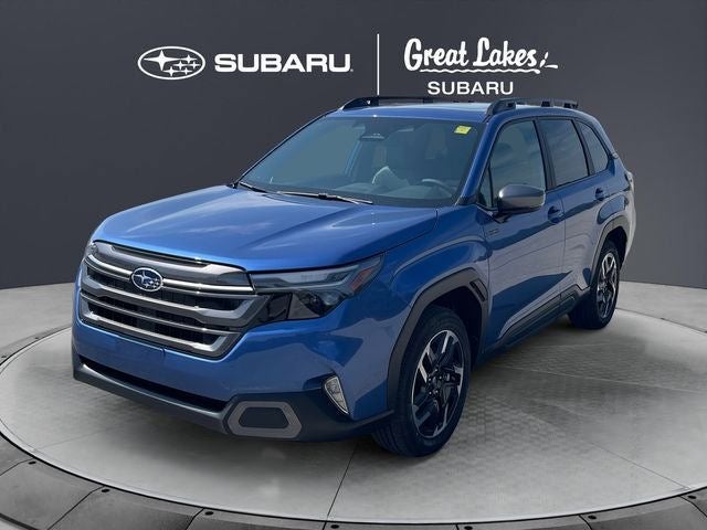 2026 Subaru FORESTER Limited Hybrid in Daybreak Blue Pearl — front three-quarter view