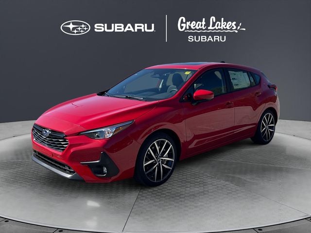 2026 Subaru IMPREZA Sport in Pure Red — front three-quarter view