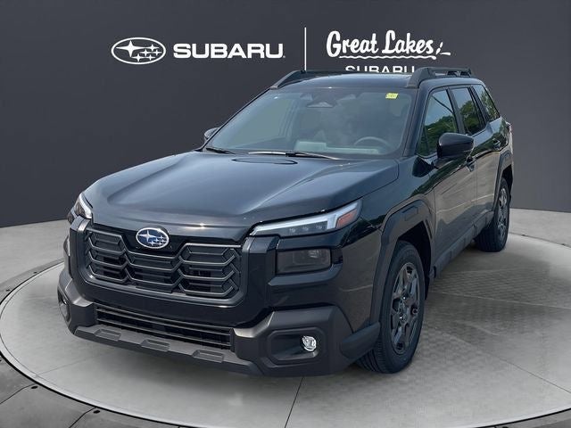 2026 Subaru OUTBACK Premium in Crystal Black Silica — front three-quarter view