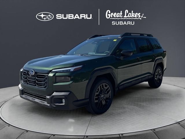 2026 Subaru OUTBACK Limited XT in Deep Emerald Green Pearl — front three-quarter view