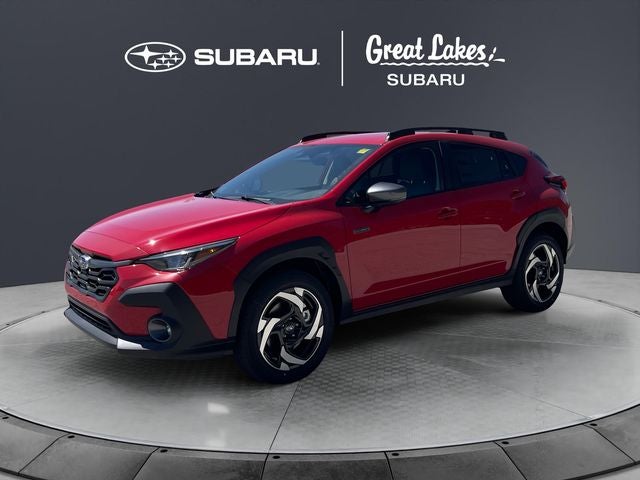 2026 Subaru CROSSTREK Limited Hybrid in Pure Red — front three-quarter view