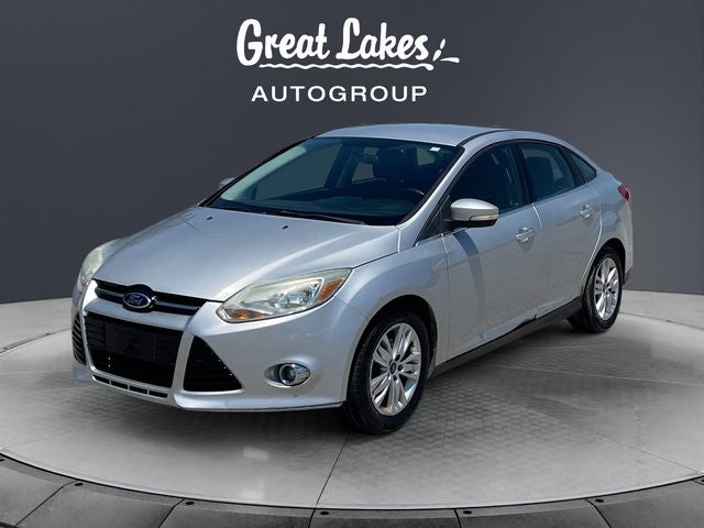 2012 Ford Focus SEL in Ingot Silver — front three-quarter view