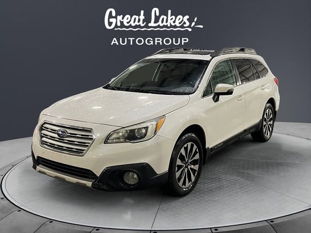 2016 Subaru Outback 2.5i Limited in Crystal White Pearl — front three-quarter view