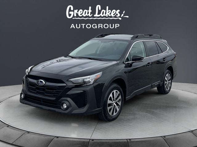 2025 Subaru Outback Premium in Crystal Black Silica — front three-quarter view