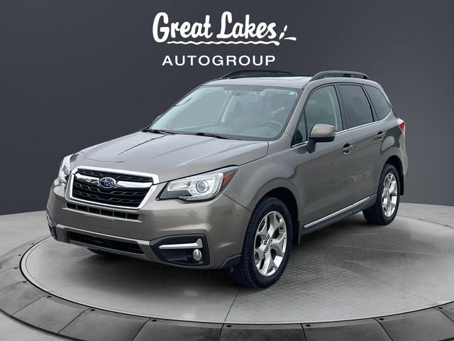 2018 Subaru Forester 2.5i Touring in Sepia Bronze Metallic — front three-quarter view