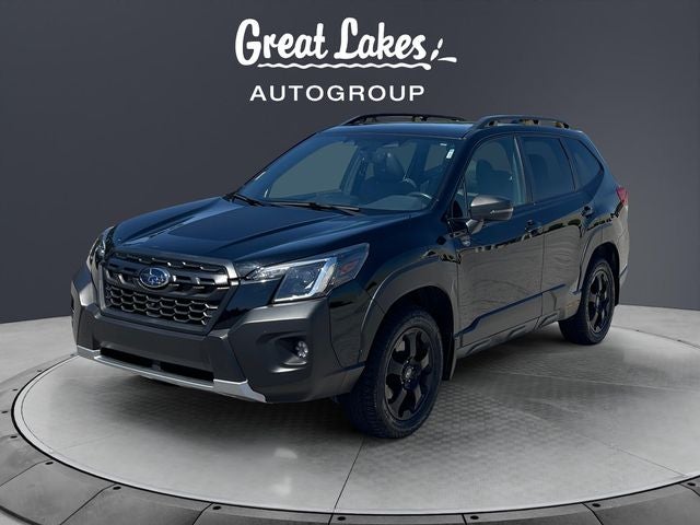 2023 Subaru Forester Wilderness in Crystal Black Silica — front three-quarter view