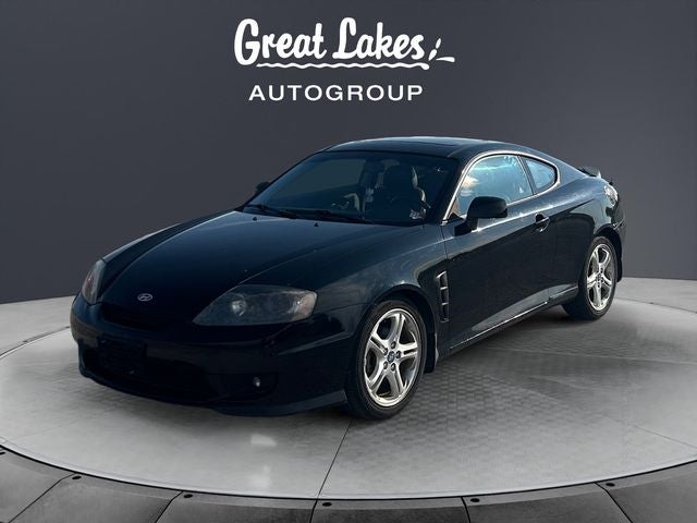 2005 Hyundai Tiburon GT in Black — front three-quarter view